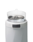 a close-up of a can in the Slim Can Cooler and the locking lid system and grey unlock button